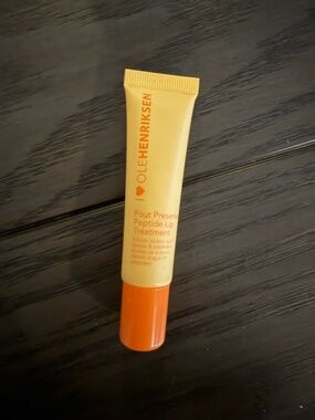 Ole Henriksen Pout Preserve Peptide Lip Treatment - Yellow Tube with Orange Cap